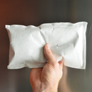 Hand holding a single FreshFry Pod.